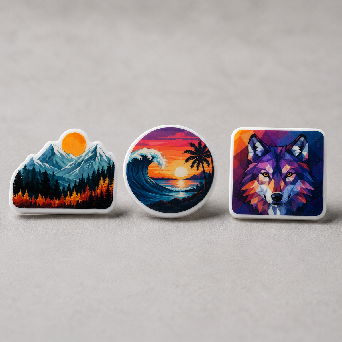White acrylic pins showing the three shape options: contour die-cut, round, and square