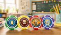 Colorful acrylic classroom reward tokens (Math Marvel, History Hero, Problem Solver) on a teacher's desk